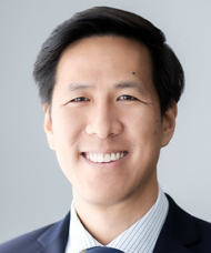 Smiling man in a business suit.