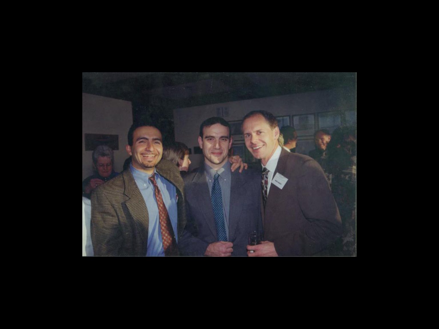 Archival photograph 4 from the 1999, 40th reunion of the Frederick C. Cordes Eye Society., showing Frederick C. Cordes Eye Society members at a reunion or banquet event.