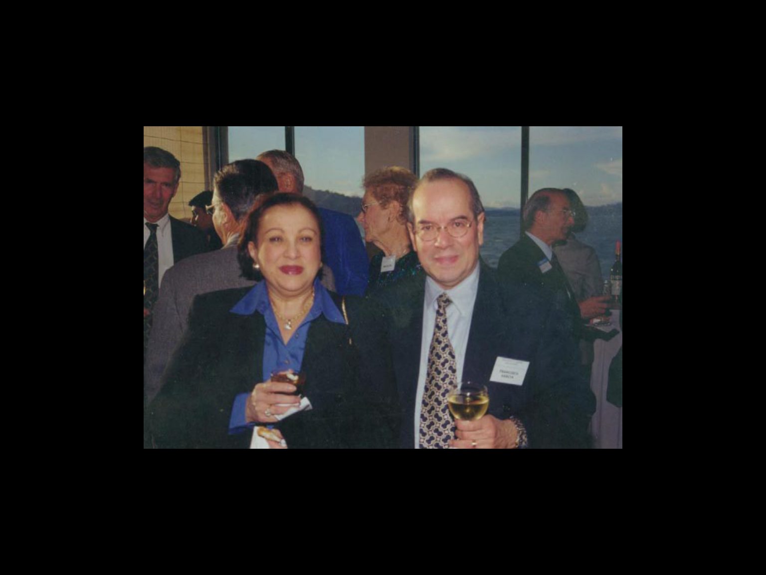 Archival photograph 8 from the 1999, 40th reunion of the Frederick C. Cordes Eye Society., showing Frederick C. Cordes Eye Society members at a reunion or banquet event.