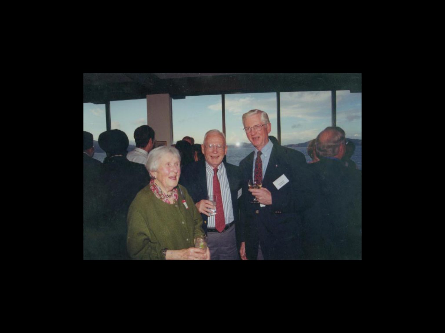 Archival photograph 13 from the 1999, 40th reunion of the Frederick C. Cordes Eye Society., showing Frederick C. Cordes Eye Society members at a reunion or banquet event.