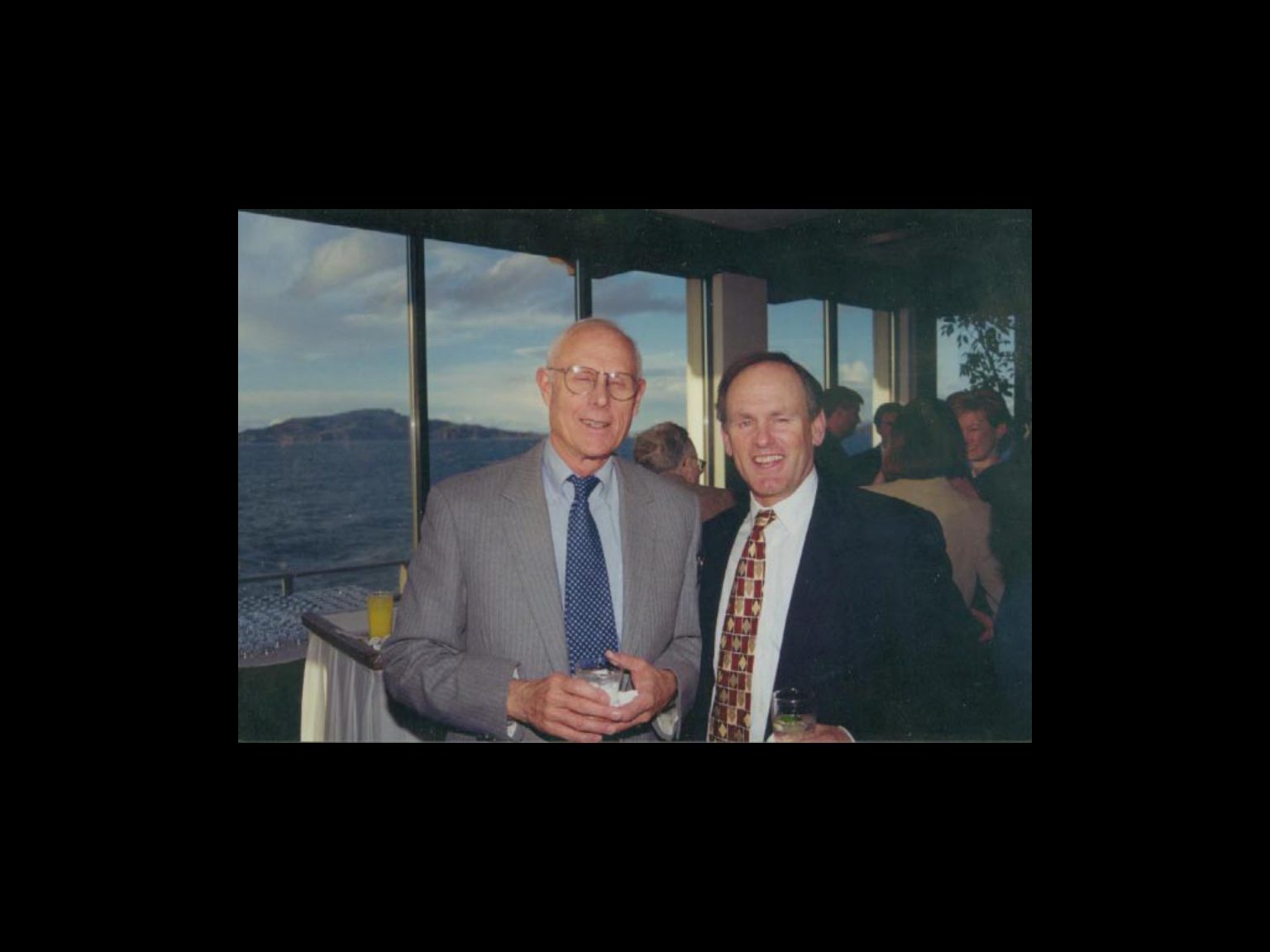 Archival photograph 14 from the 1999, 40th reunion of the Frederick C. Cordes Eye Society., showing Frederick C. Cordes Eye Society members at a reunion or banquet event.