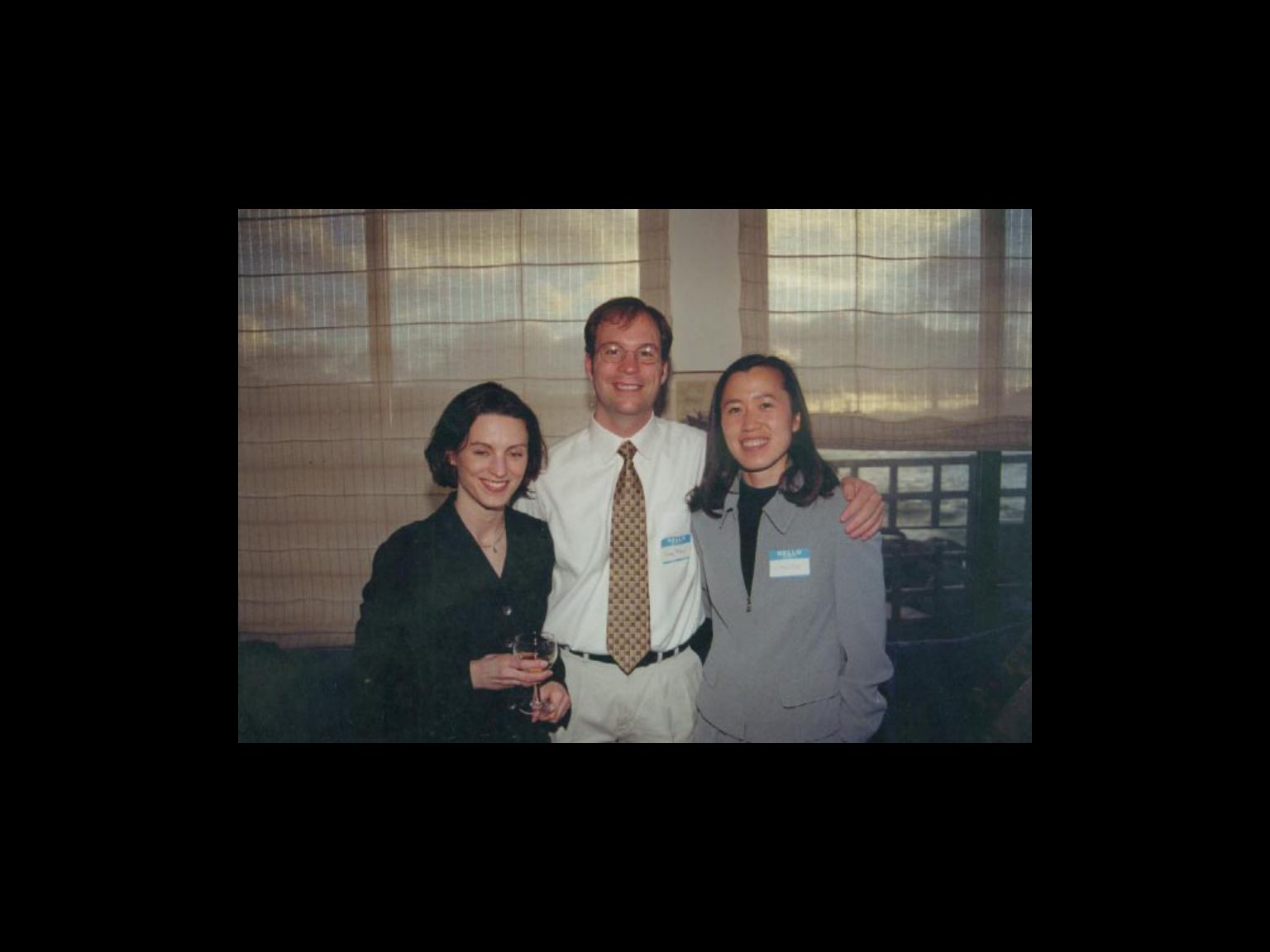 Archival photograph 19 from the 1999, 40th reunion of the Frederick C. Cordes Eye Society., showing Frederick C. Cordes Eye Society members at a reunion or banquet event.