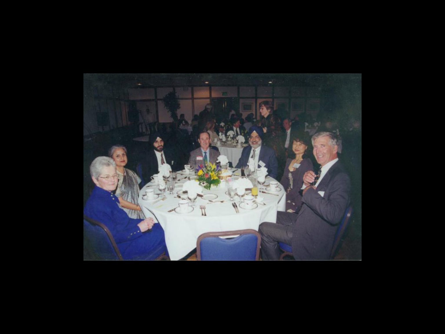 Archival photograph 30 from the 1999, 40th reunion of the Frederick C. Cordes Eye Society., showing Frederick C. Cordes Eye Society members at a reunion or banquet event.