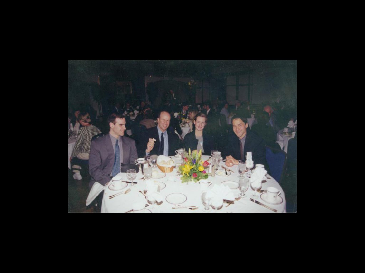 Archival photograph 31 from the 1999, 40th reunion of the Frederick C. Cordes Eye Society., showing Frederick C. Cordes Eye Society members at a reunion or banquet event.