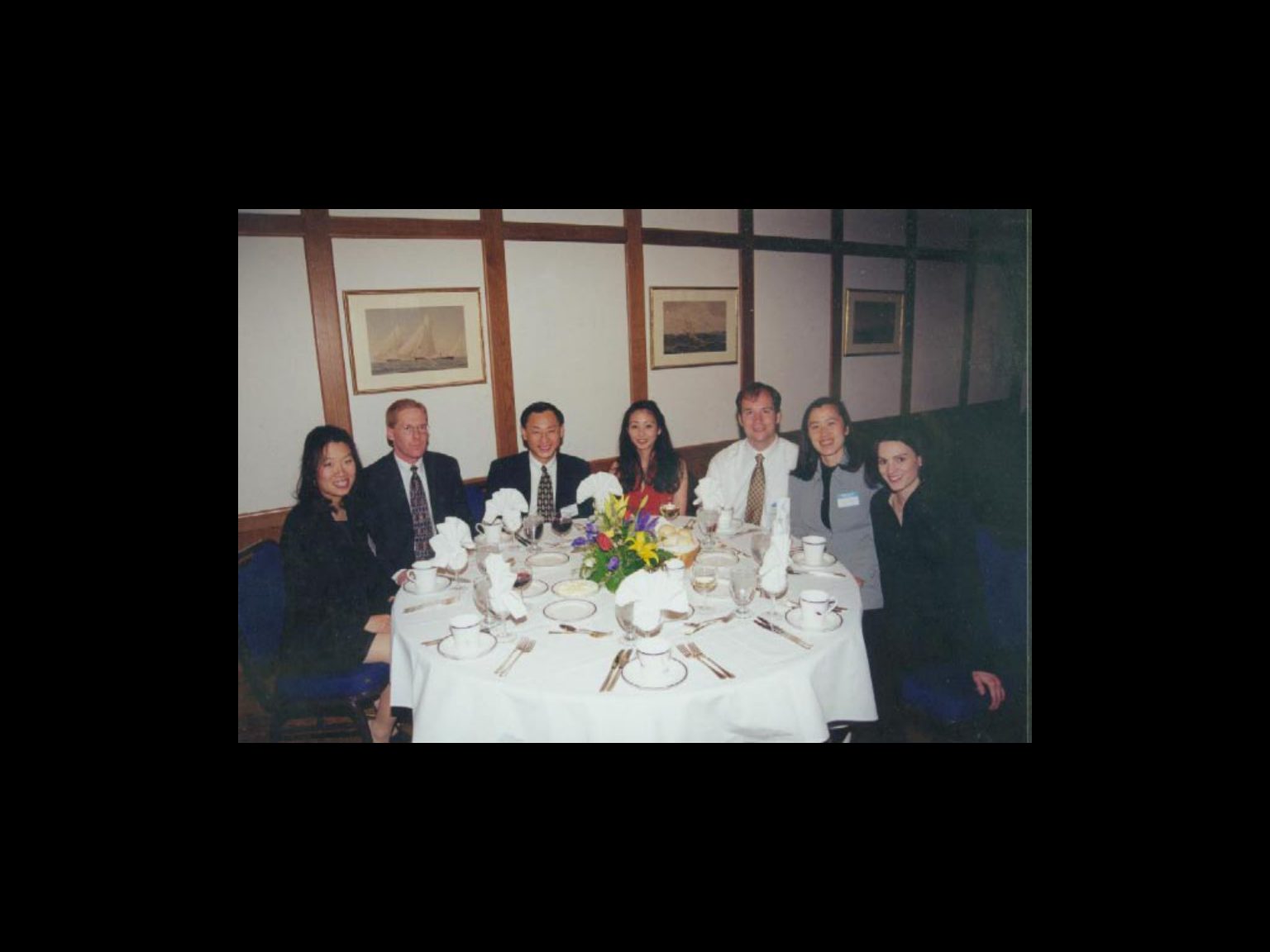 Archival photograph 39 from the 1999, 40th reunion of the Frederick C. Cordes Eye Society., showing Frederick C. Cordes Eye Society members at a reunion or banquet event.