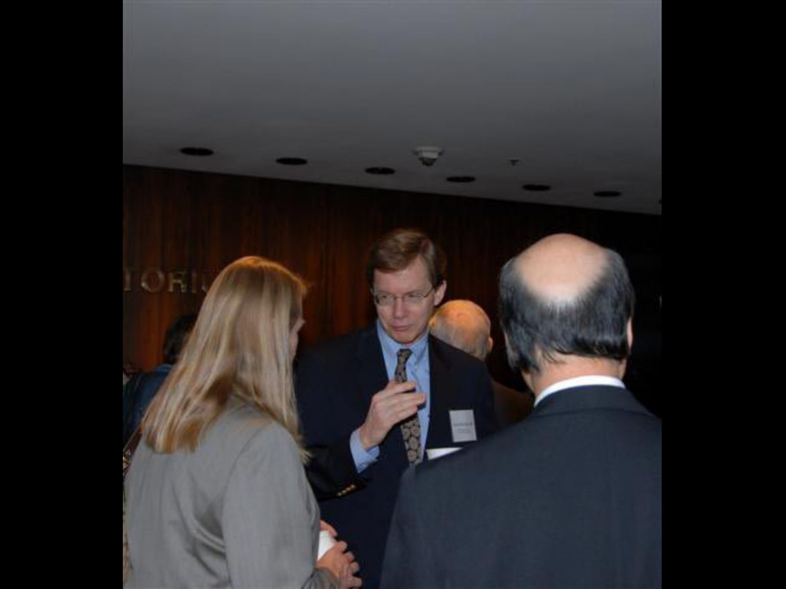 Archival photograph 18 from the 2009, 50th reunion of the Frederick C. Cordes Eye Society, provided by Greer Geiger, M.D., showing Frederick C. Cordes Eye Society members at a reunion or banquet event.