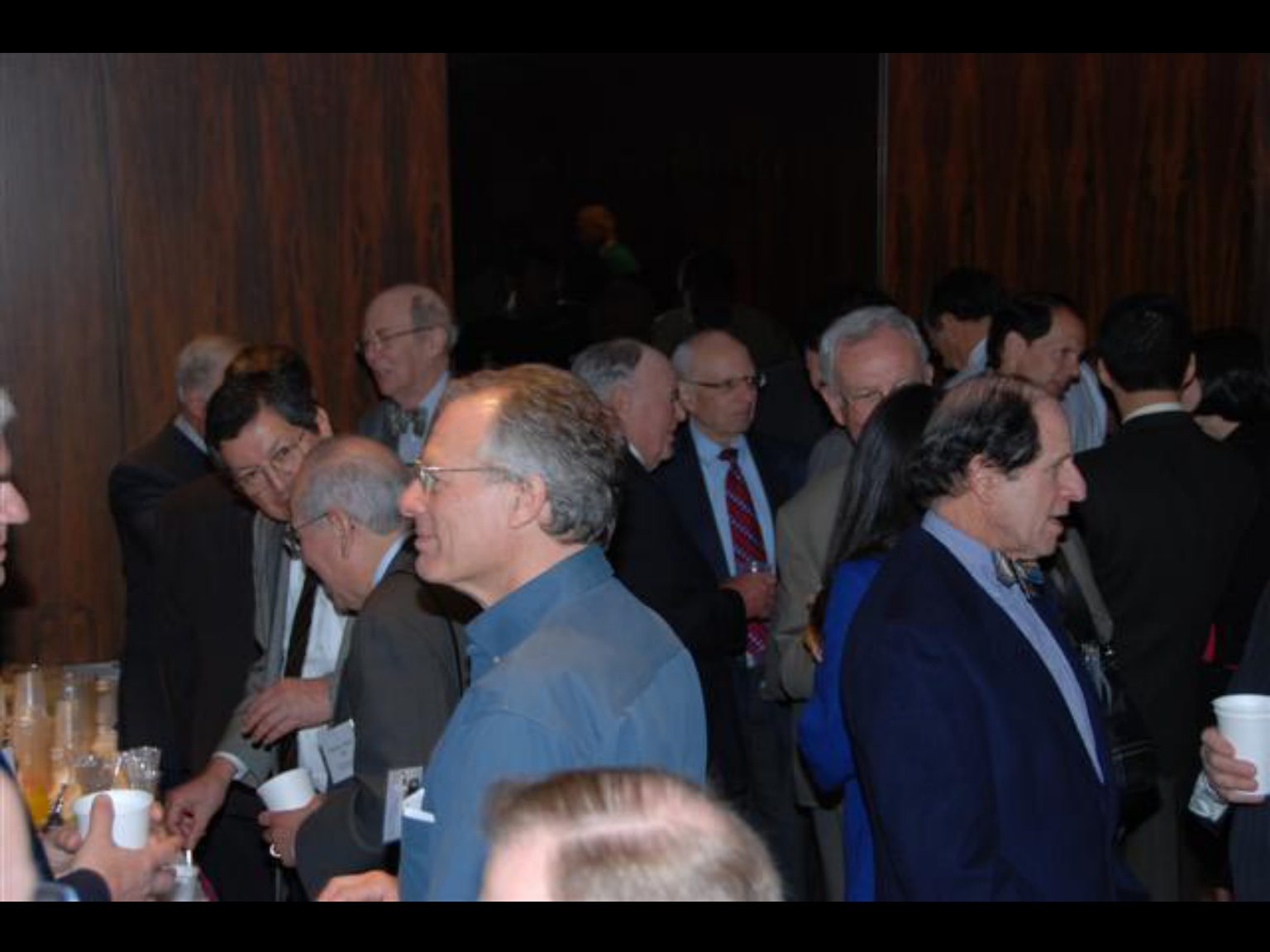 Archival photograph 22 from the 2009, 50th reunion of the Frederick C. Cordes Eye Society, provided by Greer Geiger, M.D., showing Frederick C. Cordes Eye Society members at a reunion or banquet event.
