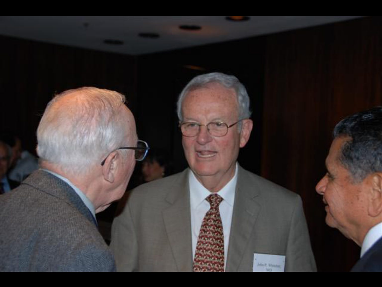 Archival photograph 23 from the 2009, 50th reunion of the Frederick C. Cordes Eye Society, provided by Greer Geiger, M.D., showing Frederick C. Cordes Eye Society members at a reunion or banquet event.