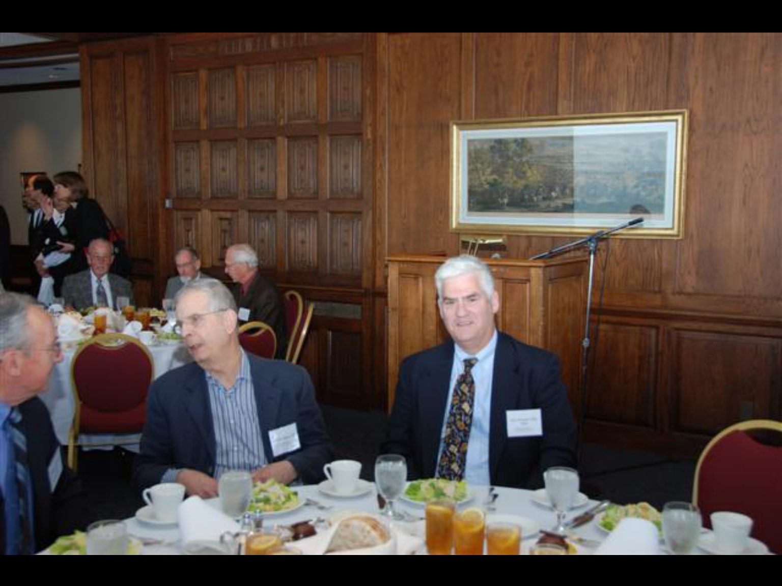 Archival photograph 57 from the 2009, 50th reunion of the Frederick C. Cordes Eye Society, provided by Greer Geiger, M.D., showing Frederick C. Cordes Eye Society members at a reunion or banquet event.