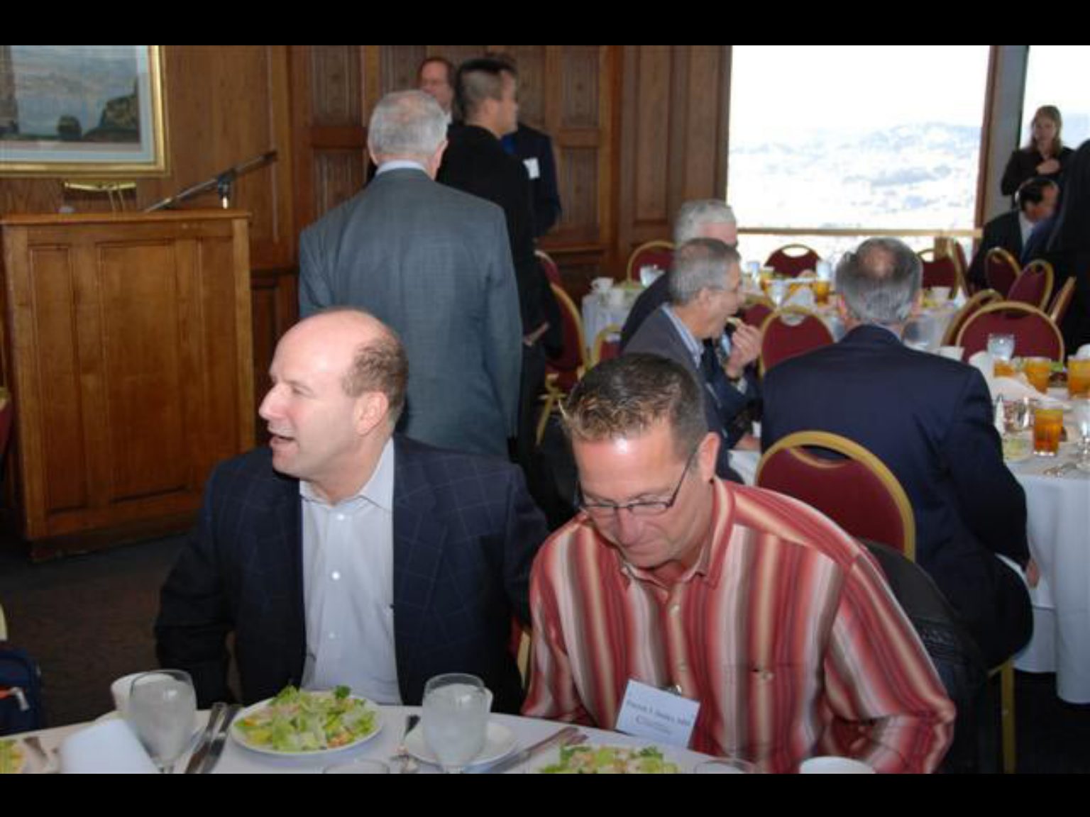 Archival photograph 59 from the 2009, 50th reunion of the Frederick C. Cordes Eye Society, provided by Greer Geiger, M.D., showing Frederick C. Cordes Eye Society members at a reunion or banquet event.