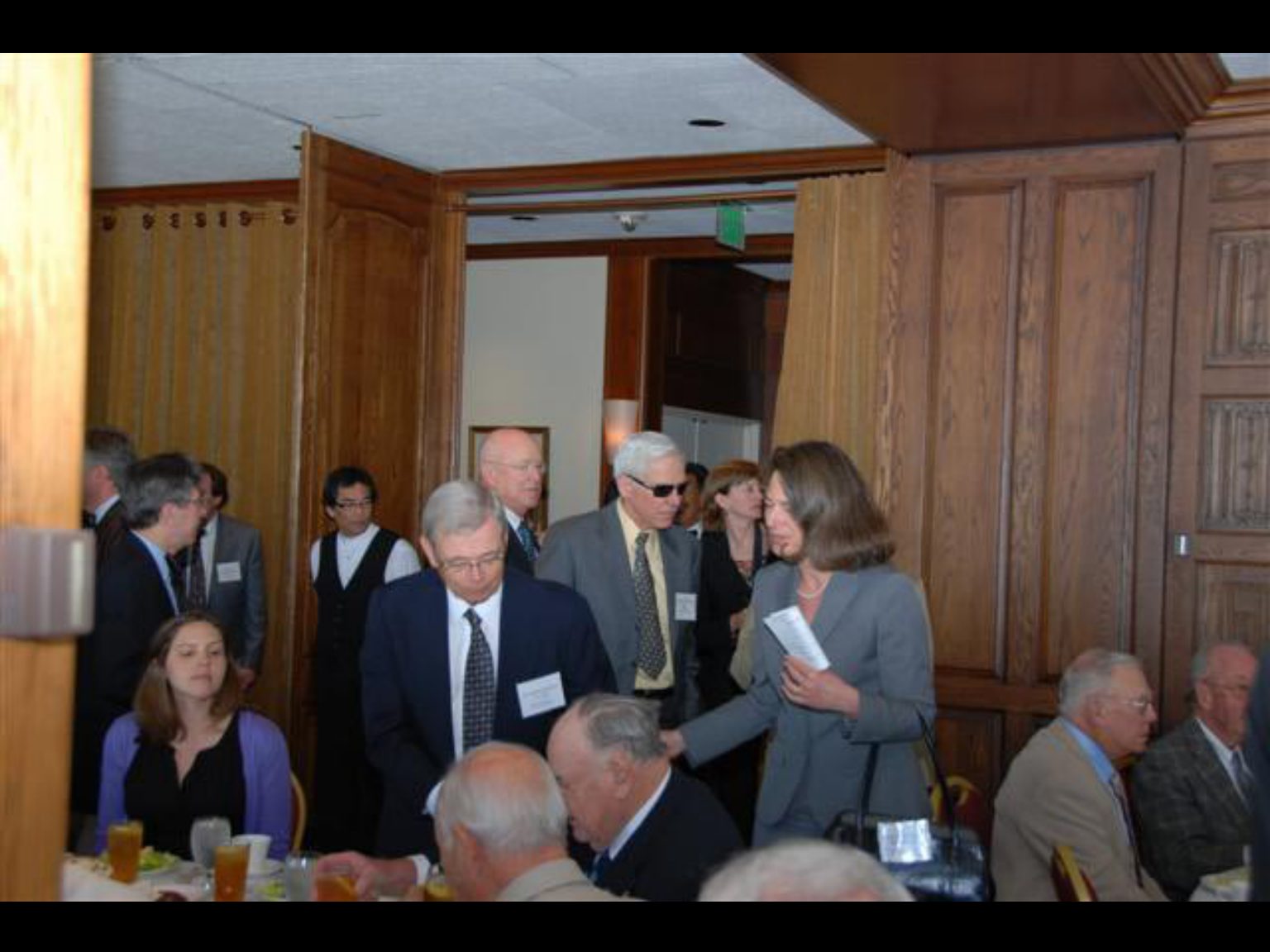 Archival photograph 61 from the 2009, 50th reunion of the Frederick C. Cordes Eye Society, provided by Greer Geiger, M.D., showing Frederick C. Cordes Eye Society members at a reunion or banquet event.