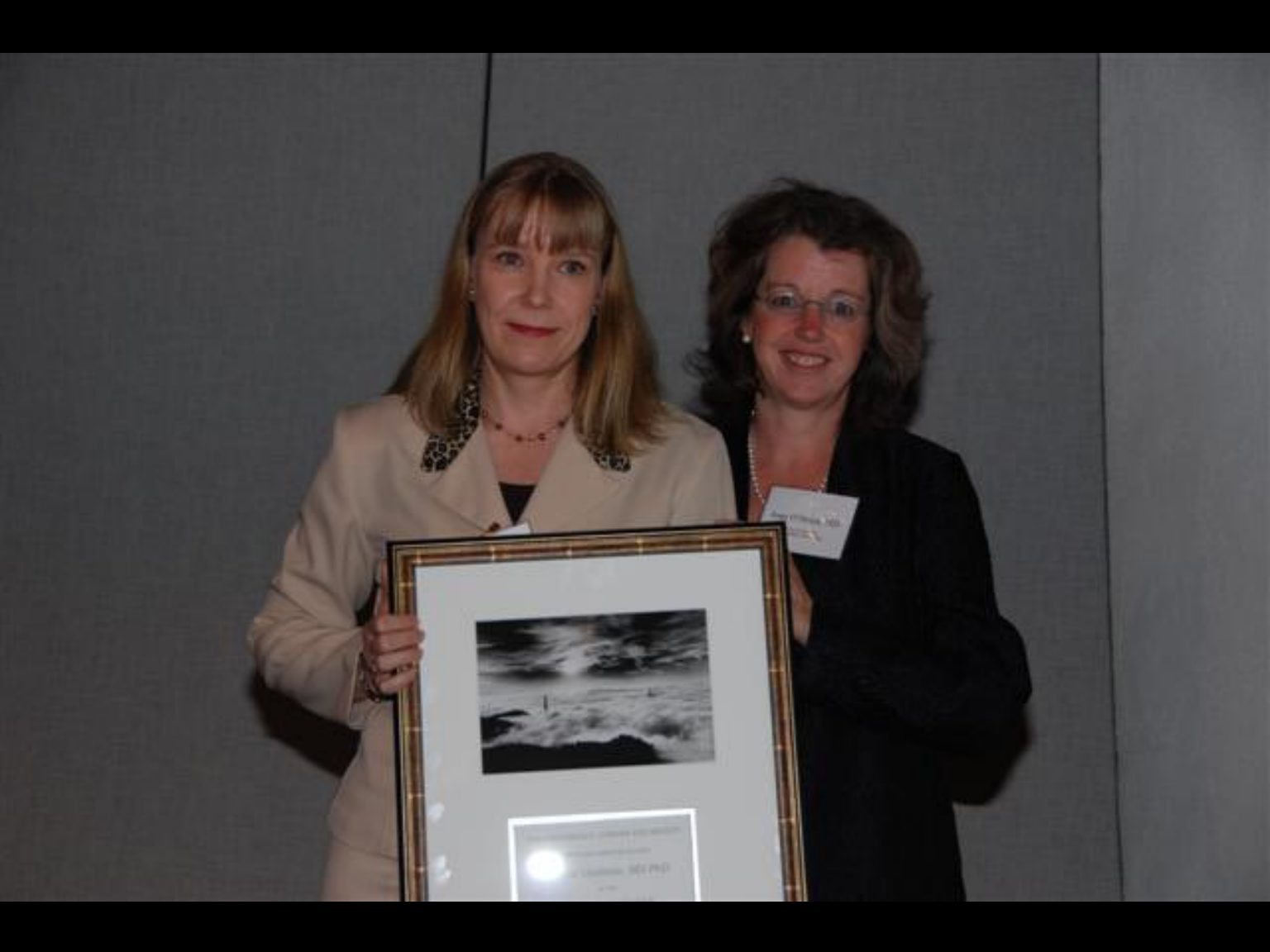 Archival photograph 80 from the 2009, 50th reunion of the Frederick C. Cordes Eye Society, provided by Greer Geiger, M.D., showing Frederick C. Cordes Eye Society members at a reunion or banquet event.