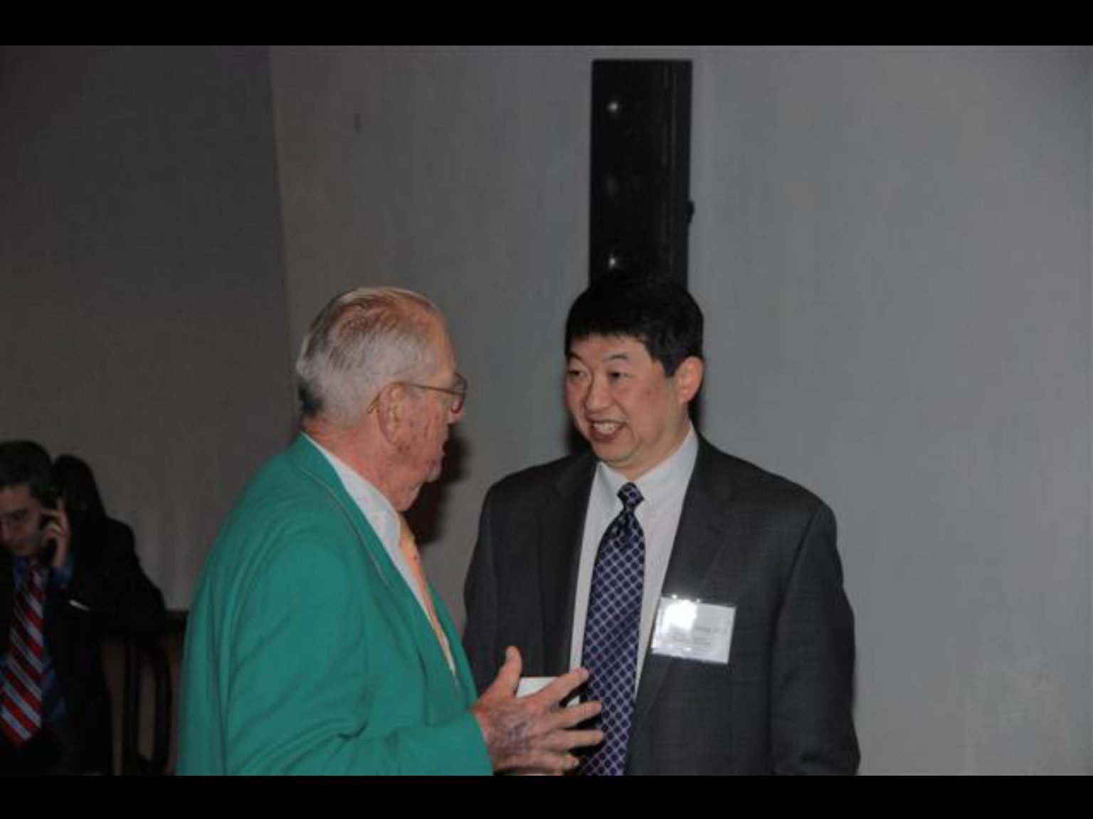 Archival photograph 11 from the (part two) from the 2009, 50th reunion of the Frederick C. Cordes Eye Society provided by Greer Geiger, M.D., showing Frederick C. Cordes Eye Society members at a reunion or banquet event.