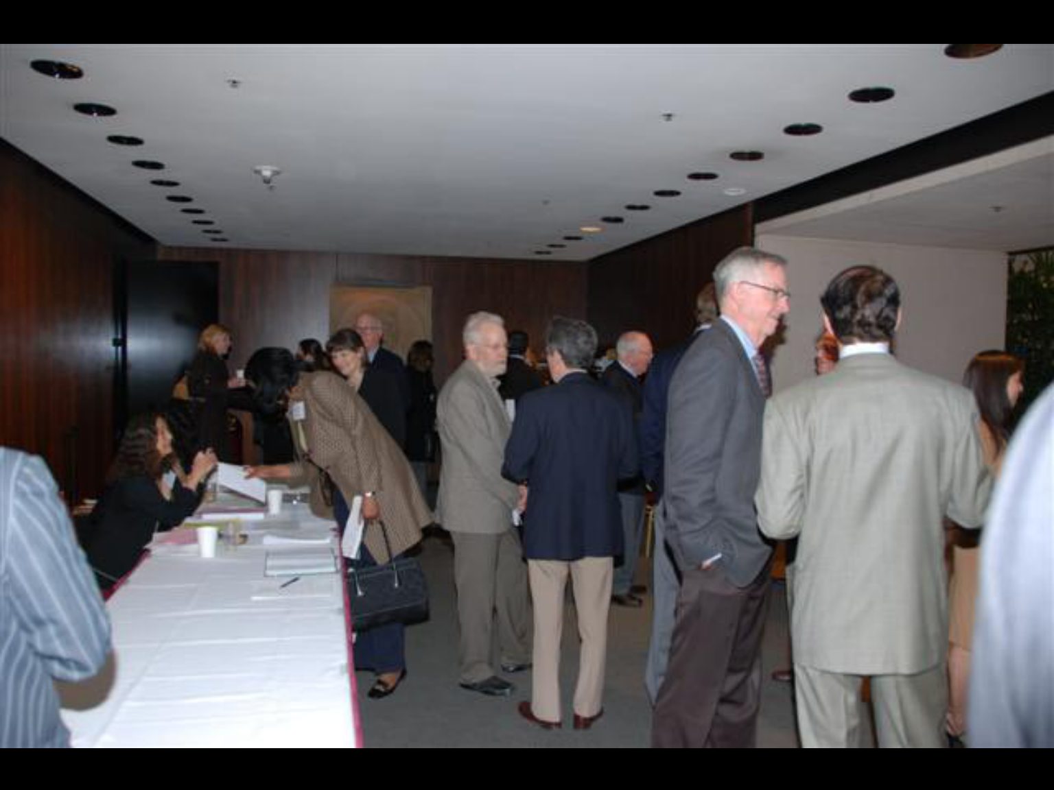 Archival photograph 15 from the (part two) from the 2009, 50th reunion of the Frederick C. Cordes Eye Society provided by Greer Geiger, M.D., showing Frederick C. Cordes Eye Society members at a reunion or banquet event.