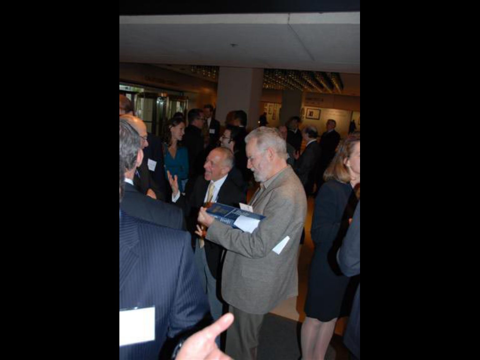 Archival photograph 18 from the (part two) from the 2009, 50th reunion of the Frederick C. Cordes Eye Society provided by Greer Geiger, M.D., showing Frederick C. Cordes Eye Society members at a reunion or banquet event.