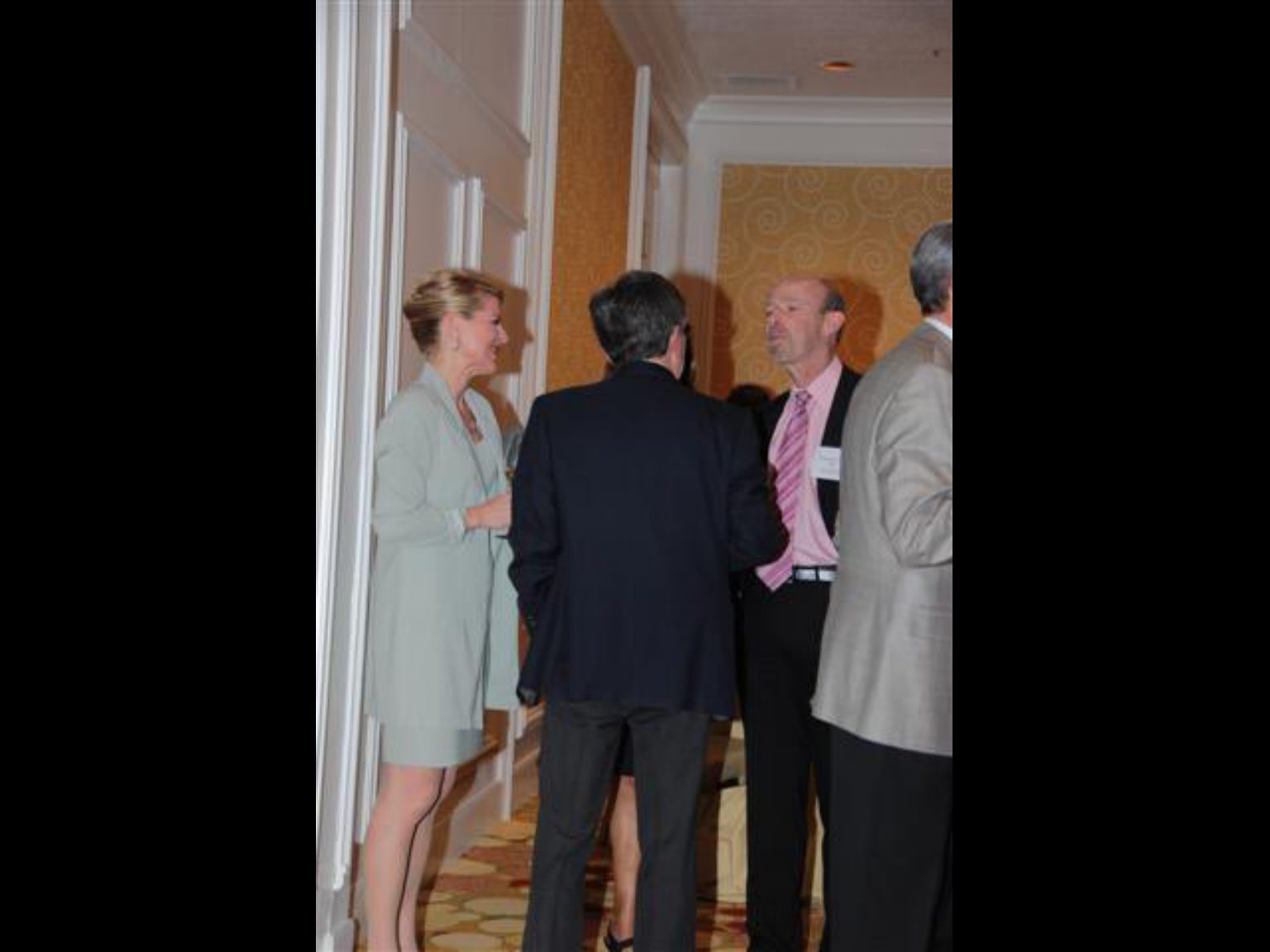 Archival photograph 60 from the (part two) from the 2009, 50th reunion of the Frederick C. Cordes Eye Society provided by Greer Geiger, M.D., showing Frederick C. Cordes Eye Society members at a reunion or banquet event.