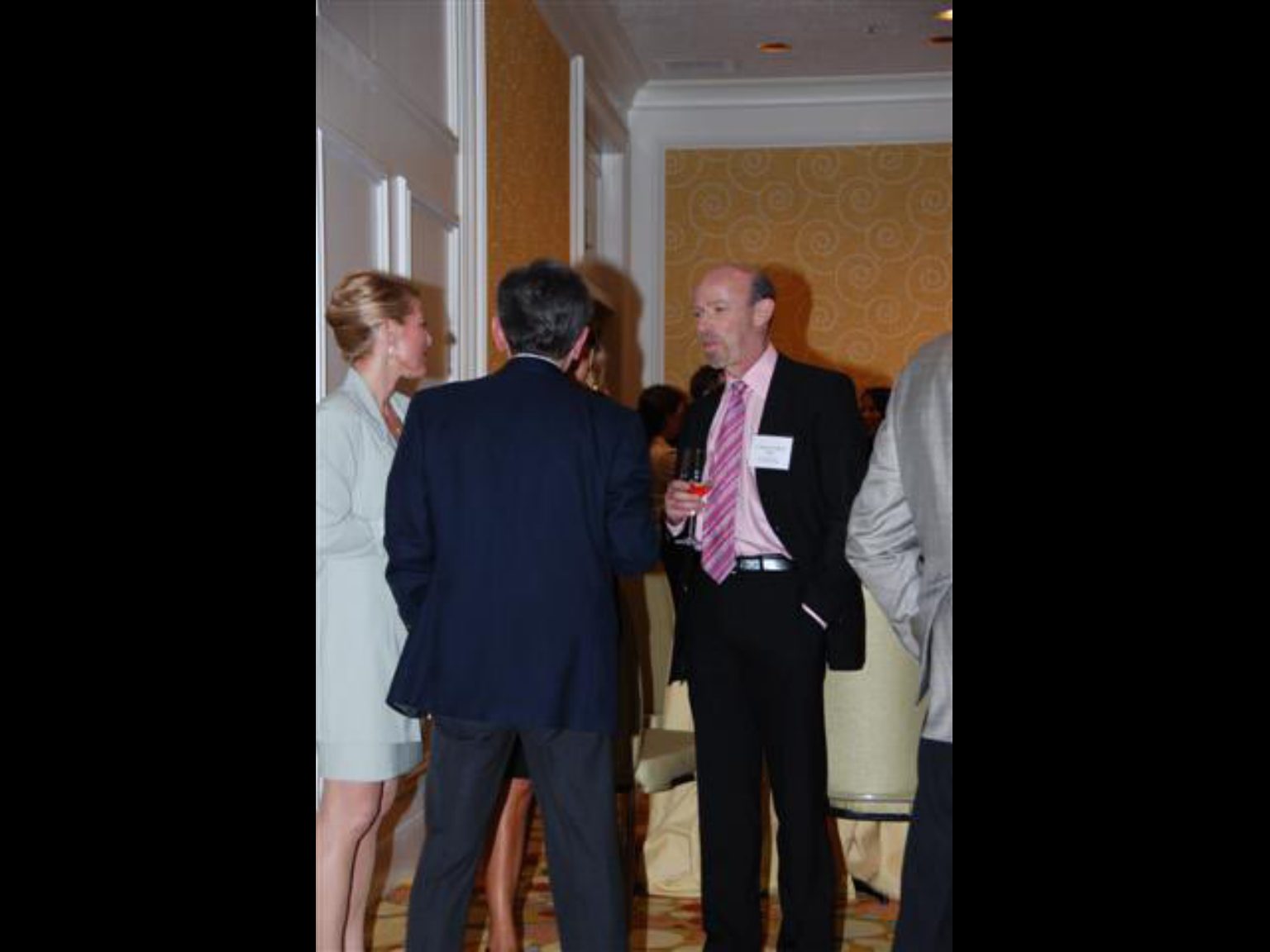 Archival photograph 61 from the (part two) from the 2009, 50th reunion of the Frederick C. Cordes Eye Society provided by Greer Geiger, M.D., showing Frederick C. Cordes Eye Society members at a reunion or banquet event.