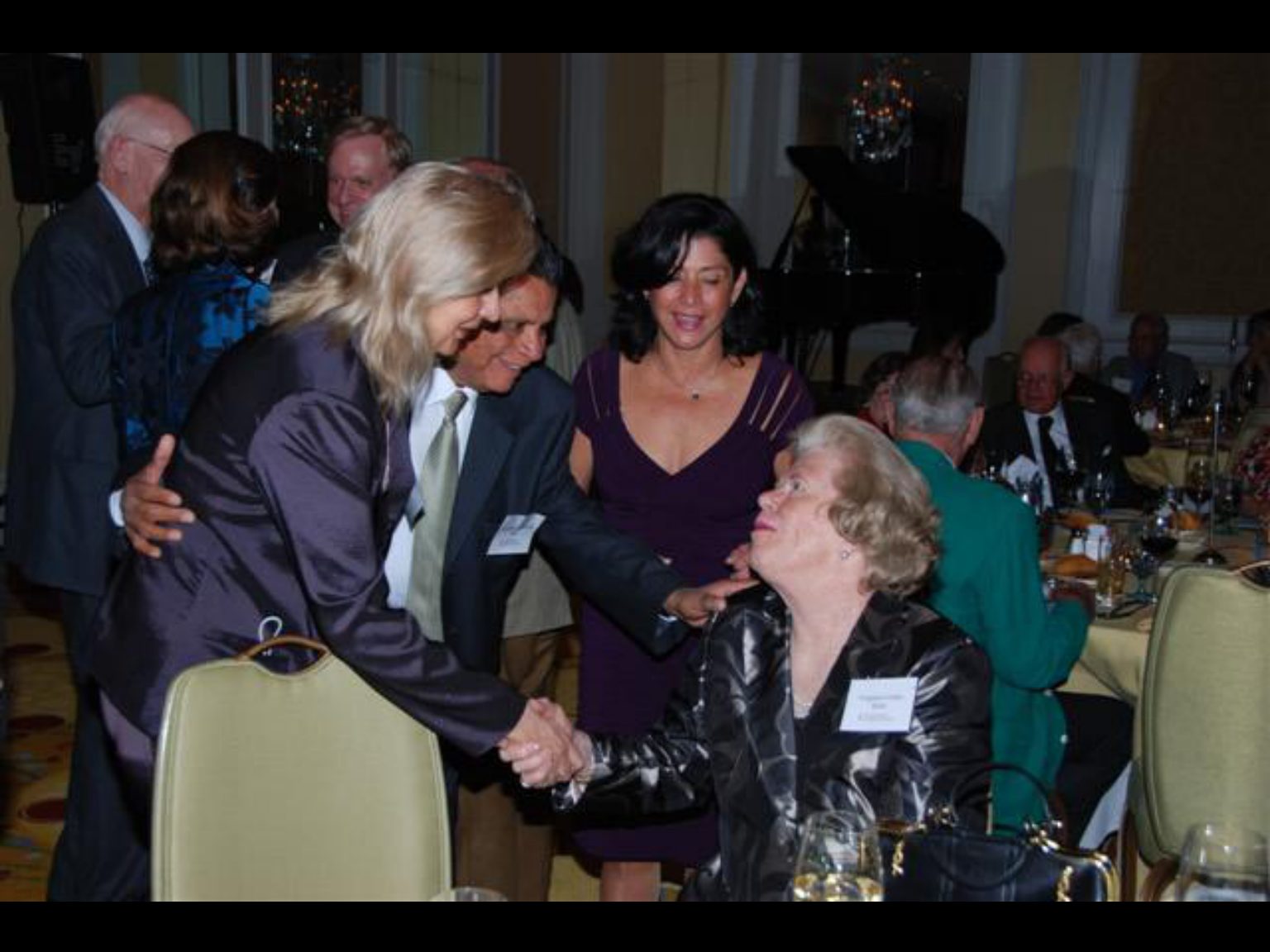 Archival photograph 75 from the (part two) from the 2009, 50th reunion of the Frederick C. Cordes Eye Society provided by Greer Geiger, M.D., showing Frederick C. Cordes Eye Society members at a reunion or banquet event.